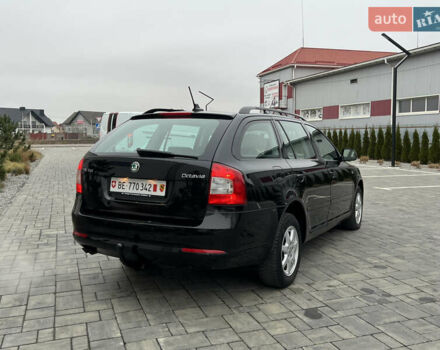 Черный Шкода Октавия, объемом двигателя 2 л и пробегом 229 тыс. км за 11650 $, фото 169 на Automoto.ua