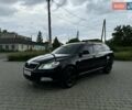 Черный Шкода Октавия, объемом двигателя 1.97 л и пробегом 329 тыс. км за 7650 $, фото 1 на Automoto.ua