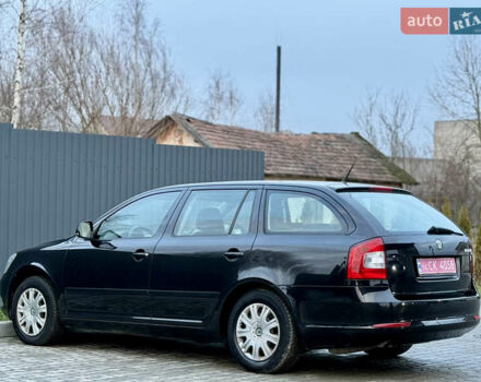 Черный Шкода Октавия, объемом двигателя 1.6 л и пробегом 202 тыс. км за 7490 $, фото 108 на Automoto.ua