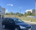 Черный Шкода Октавия, объемом двигателя 1.4 л и пробегом 204 тыс. км за 6488 $, фото 1 на Automoto.ua