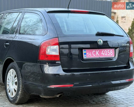 Черный Шкода Октавия, объемом двигателя 1.6 л и пробегом 202 тыс. км за 7490 $, фото 110 на Automoto.ua