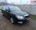 Черный Шкода Октавия, объемом двигателя 2 л и пробегом 249 тыс. км за 8600 $, фото 2 на Automoto.ua