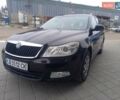 Черный Шкода Октавия, объемом двигателя 1.2 л и пробегом 175 тыс. км за 6500 $, фото 1 на Automoto.ua