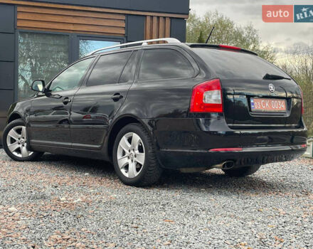 Чорний Шкода Октавія, об'ємом двигуна 2 л та пробігом 223 тис. км за 8999 $, фото 26 на Automoto.ua