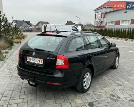 Черный Шкода Октавия, объемом двигателя 2 л и пробегом 229 тыс. км за 11650 $, фото 170 на Automoto.ua