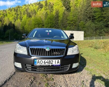 Черный Шкода Октавия, объемом двигателя 2 л и пробегом 241 тыс. км за 9400 $, фото 1 на Automoto.ua
