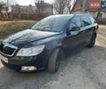 Черный Шкода Октавия, объемом двигателя 1.6 л и пробегом 245 тыс. км за 7799 $, фото 1 на Automoto.ua