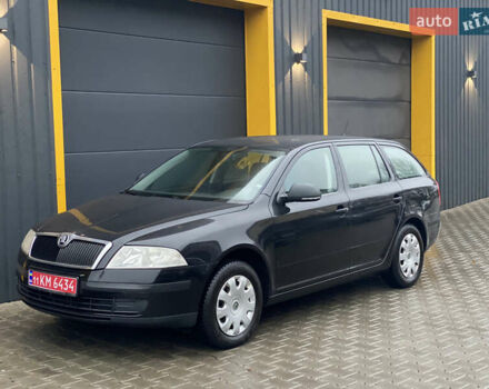 Черный Шкода Октавия, объемом двигателя 1.6 л и пробегом 198 тыс. км за 6999 $, фото 2 на Automoto.ua