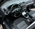 Черный Шкода Октавия, объемом двигателя 1.2 л и пробегом 155 тыс. км за 6400 $, фото 1 на Automoto.ua