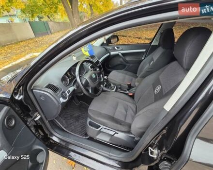Черный Шкода Октавия, объемом двигателя 1.6 л и пробегом 243 тыс. км за 8999 $, фото 9 на Automoto.ua