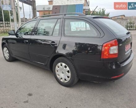 Черный Шкода Октавия, объемом двигателя 1.6 л и пробегом 221 тыс. км за 8750 $, фото 12 на Automoto.ua