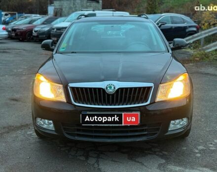Черный Шкода Октавия, объемом двигателя 1.6 л и пробегом 237 тыс. км за 8190 $, фото 1 на Automoto.ua