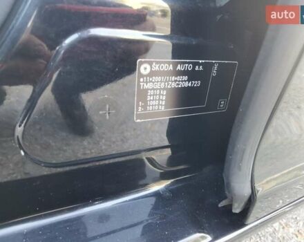 Черный Шкода Октавия, объемом двигателя 2 л и пробегом 178 тыс. км за 10250 $, фото 77 на Automoto.ua