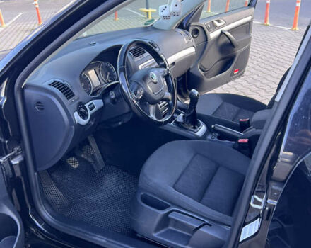 Черный Шкода Октавия, объемом двигателя 2 л и пробегом 232 тыс. км за 8999 $, фото 4 на Automoto.ua