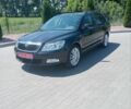 Чорний Шкода Октавія, об'ємом двигуна 2 л та пробігом 182 тис. км за 10950 $, фото 1 на Automoto.ua