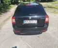 Черный Шкода Октавия, объемом двигателя 1.8 л и пробегом 215 тыс. км за 8700 $, фото 5 на Automoto.ua
