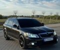 Черный Шкода Октавия, объемом двигателя 2 л и пробегом 246 тыс. км за 11800 $, фото 1 на Automoto.ua