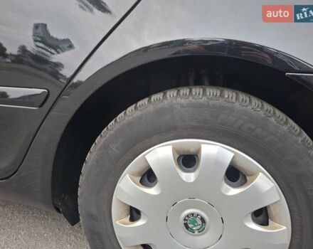 Черный Шкода Октавия, объемом двигателя 1.6 л и пробегом 221 тыс. км за 8750 $, фото 24 на Automoto.ua