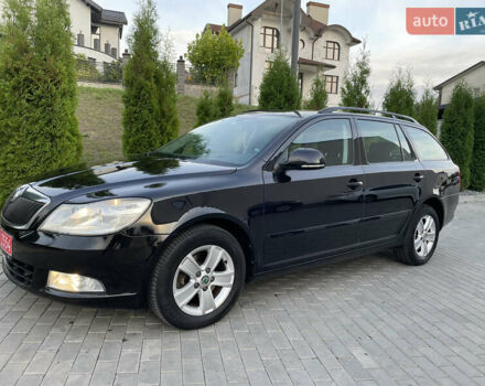 Чорний Шкода Октавія, об'ємом двигуна 1.6 л та пробігом 194 тис. км за 9399 $, фото 5 на Automoto.ua