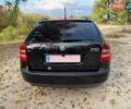 Шкода Октавия 2011 в Полтаве на Automoto.ua Черный Шкода Октавия, объемом двигателя 1.6 л и пробегом 220 тыс. км за 7600 $, фото 26 на Automoto.ua