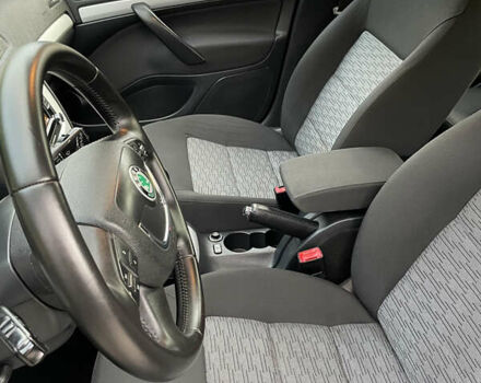 Чорний Шкода Октавія, об'ємом двигуна 1.6 л та пробігом 194 тис. км за 9399 $, фото 109 на Automoto.ua