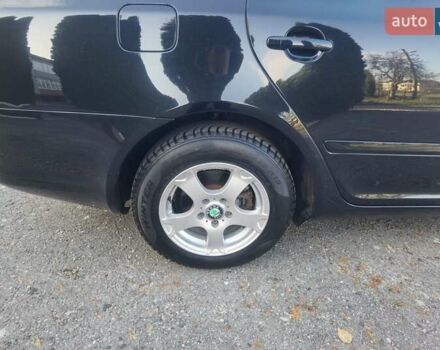 Черный Шкода Октавия, объемом двигателя 2 л и пробегом 178 тыс. км за 10250 $, фото 18 на Automoto.ua