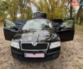 Шкода Октавия 2011 в Полтаве на Automoto.ua Черный Шкода Октавия, объемом двигателя 1.6 л и пробегом 220 тыс. км за 7600 $, фото 68 на Automoto.ua