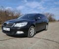 Черный Шкода Октавия, объемом двигателя 1.6 л и пробегом 251 тыс. км за 8000 $, фото 1 на Automoto.ua