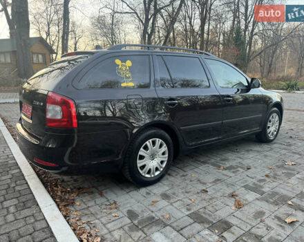 Черный Шкода Октавия, объемом двигателя 1.6 л и пробегом 243 тыс. км за 8350 $, фото 90 на Automoto.ua