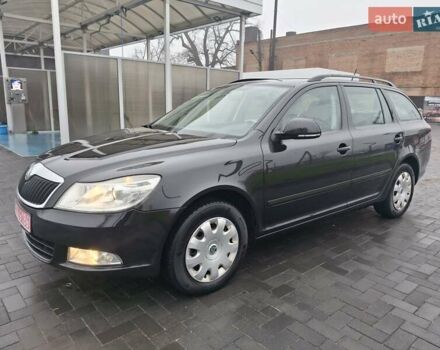 Чорний Шкода Октавія, об'ємом двигуна 1.6 л та пробігом 221 тис. км за 8600 $, фото 1 на Automoto.ua