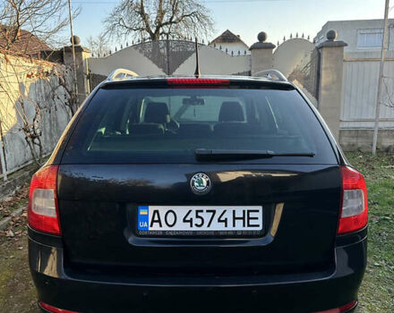 Черный Шкода Октавия, объемом двигателя 1.6 л и пробегом 200 тыс. км за 8800 $, фото 2 на Automoto.ua