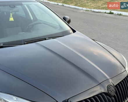 Черный Шкода Октавия, объемом двигателя 1.2 л и пробегом 240 тыс. км за 6950 $, фото 9 на Automoto.ua