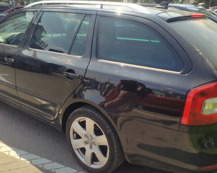 Чорний Шкода Октавія, об'ємом двигуна 1.2 л та пробігом 240 тис. км за 6600 $, фото 4 на Automoto.ua