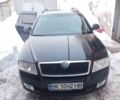 Черный Шкода Октавия, объемом двигателя 1.6 л и пробегом 317 тыс. км за 5550 $, фото 1 на Automoto.ua