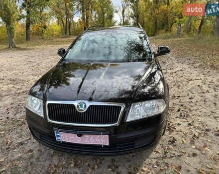 Шкода Октавия 2011 в Полтаве на Automoto.ua Черный Шкода Октавия, объемом двигателя 1.6 л и пробегом 220 тыс. км за 7600 $, фото 4 на Automoto.ua