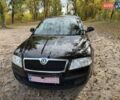 Шкода Октавия 2011 в Полтаве на Automoto.ua Черный Шкода Октавия, объемом двигателя 1.6 л и пробегом 220 тыс. км за 7600 $, фото 4 на Automoto.ua