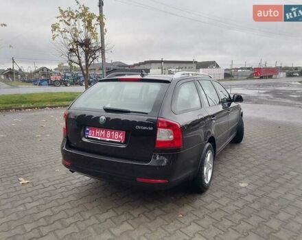 Чорний Шкода Октавія, об'ємом двигуна 1.2 л та пробігом 183 тис. км за 6300 $, фото 7 на Automoto.ua