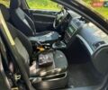 Черный Шкода Октавия, объемом двигателя 1.6 л и пробегом 220 тыс. км за 6500 $, фото 1 на Automoto.ua