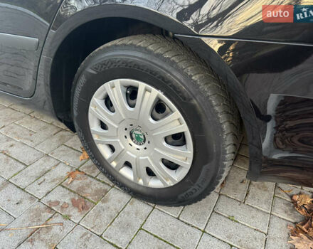 Черный Шкода Октавия, объемом двигателя 1.6 л и пробегом 243 тыс. км за 8350 $, фото 93 на Automoto.ua