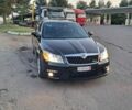 Черный Шкода Октавия, объемом двигателя 2 л и пробегом 266 тыс. км за 9299 $, фото 1 на Automoto.ua