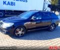 Черный Шкода Октавия, объемом двигателя 2 л и пробегом 215 тыс. км за 12300 $, фото 1 на Automoto.ua