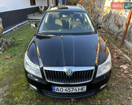 Черный Шкода Октавия, объемом двигателя 1.6 л и пробегом 200 тыс. км за 8800 $, фото 1 на Automoto.ua