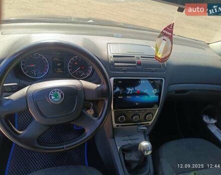 Черный Шкода Октавия, объемом двигателя 1.6 л и пробегом 225 тыс. км за 6800 $, фото 1 на Automoto.ua