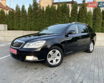 Чорний Шкода Октавія, об'ємом двигуна 2 л та пробігом 228 тис. км за 10799 $, фото 7 на Automoto.ua