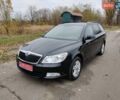Черный Шкода Октавия, объемом двигателя 1.6 л и пробегом 228 тыс. км за 8600 $, фото 1 на Automoto.ua