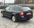 Черный Шкода Октавия, объемом двигателя 2 л и пробегом 220 тыс. км за 12500 $, фото 6 на Automoto.ua