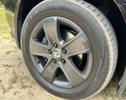 Черный Шкода Октавия, объемом двигателя 2 л и пробегом 288 тыс. км за 9699 $, фото 7 на Automoto.ua