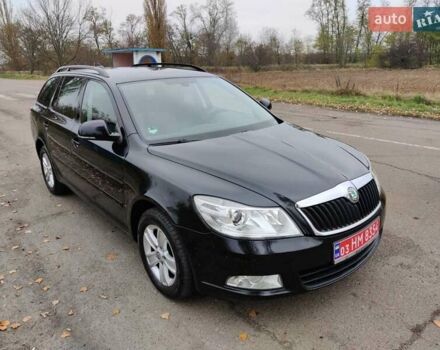 Черный Шкода Октавия, объемом двигателя 1.6 л и пробегом 228 тыс. км за 8600 $, фото 1 на Automoto.ua
