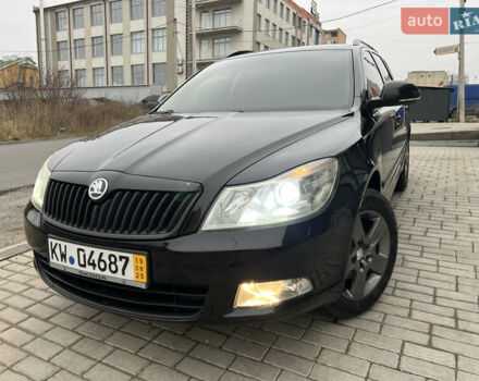 Черный Шкода Октавия, объемом двигателя 2 л и пробегом 234 тыс. км за 8899 $, фото 1 на Automoto.ua