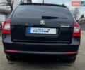 Черный Шкода Октавия, объемом двигателя 1.6 л и пробегом 235 тыс. км за 8499 $, фото 1 на Automoto.ua